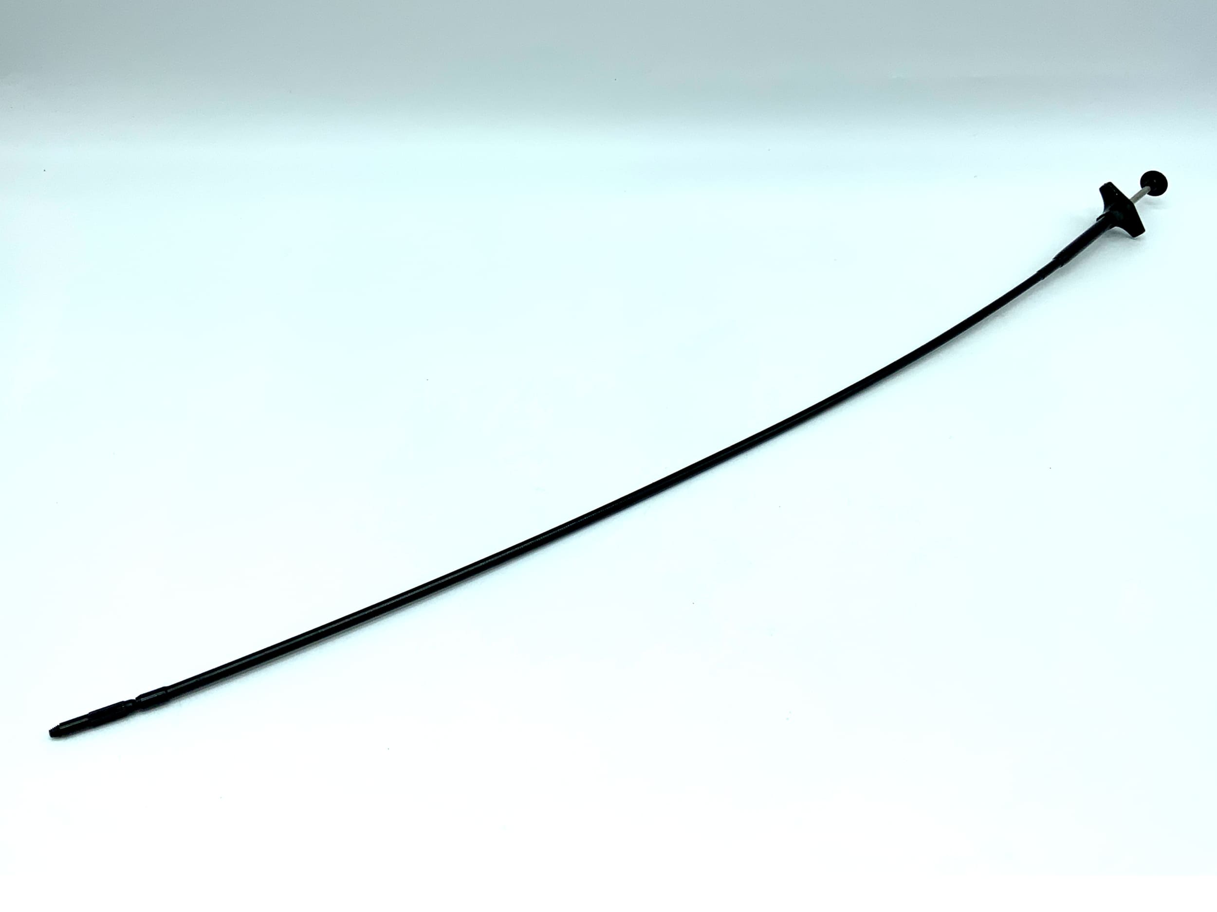Déclencheur à distance noir, environ 50 cm, avec mécanisme de verrouillage.