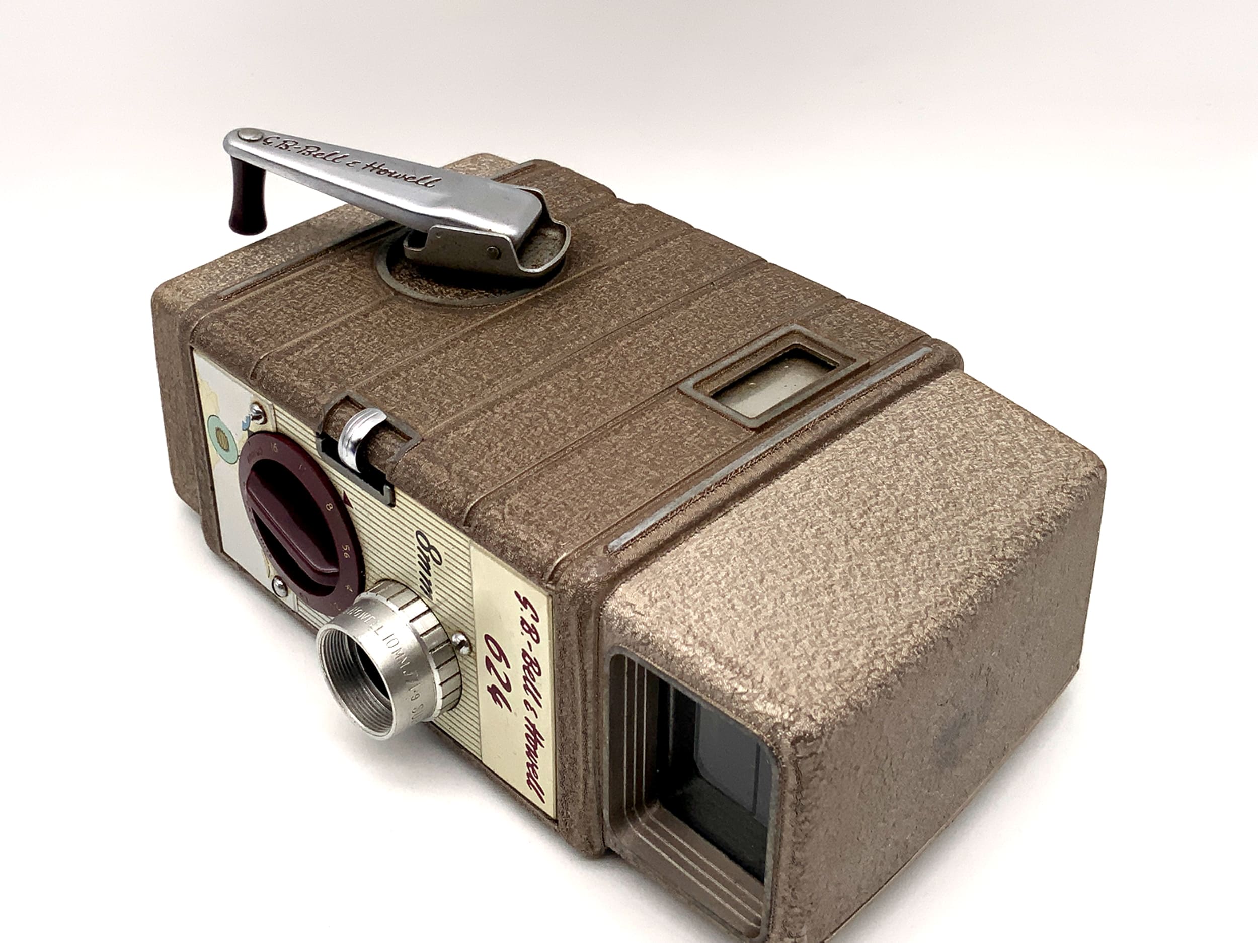 Appareil photo Bell &amp; Howell 624 avec film double 8 mm Super Comat 10 mm f/1.9