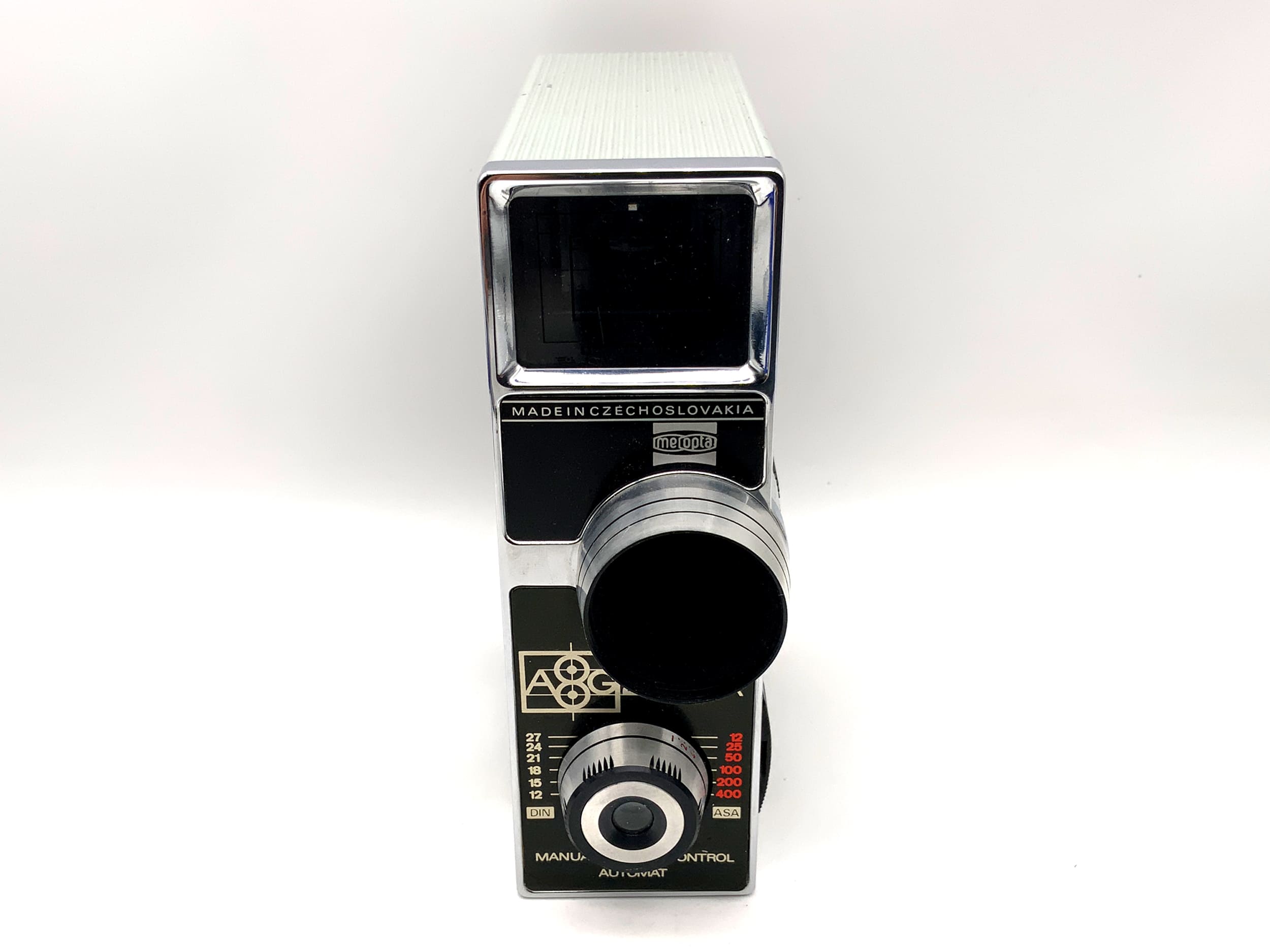 Appareil photo argentique Meopta A8G2 Supra avec objectif Mirar 2.8/13 et poignée pour double film 8 mm.