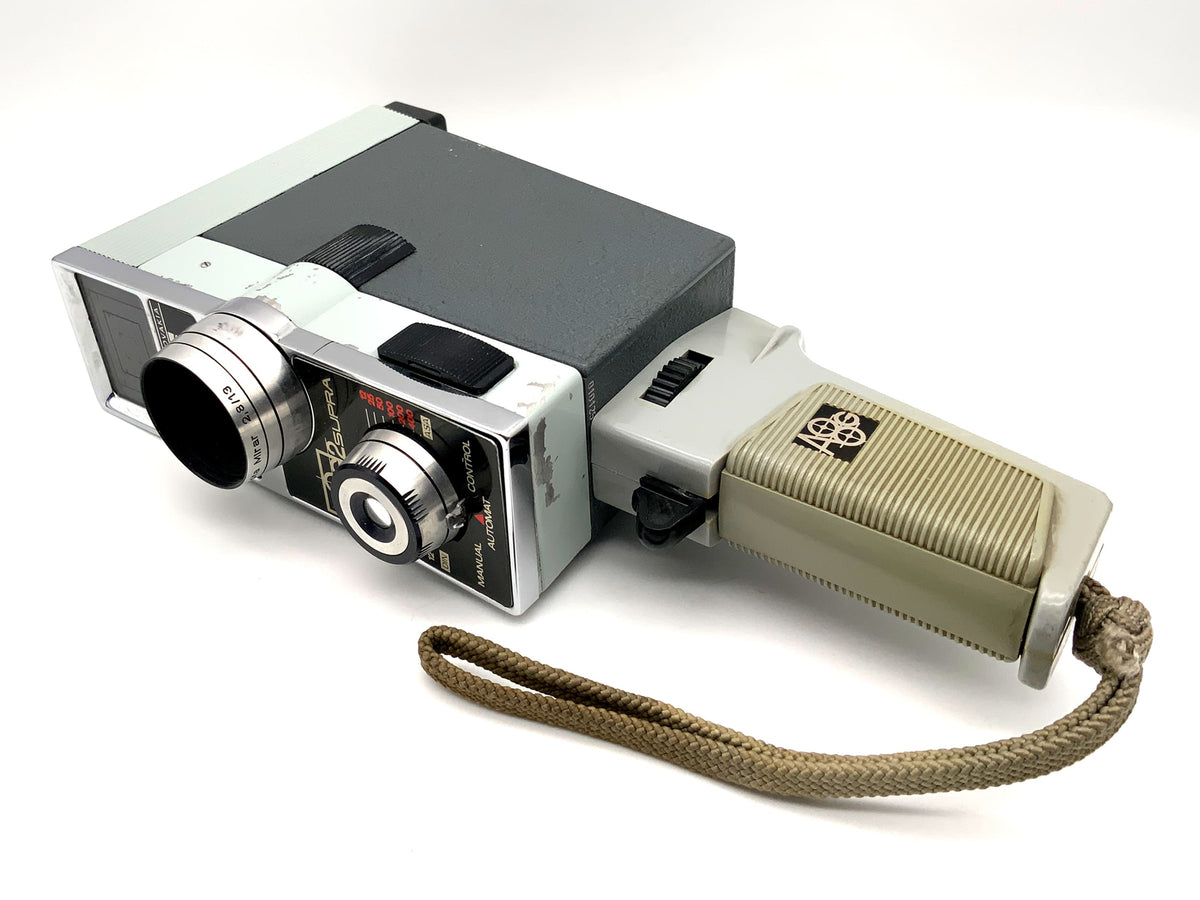 Appareil photo argentique Meopta A8G2 Supra avec objectif Mirar 2.8/13 et poignée pour double film 8 mm.