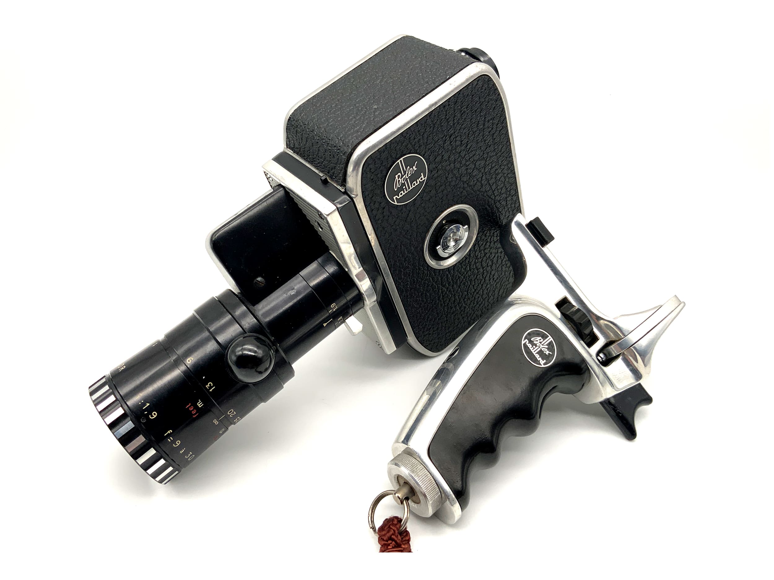 Bolex Paillard Zoom Reflex P2 film camera with 1:1.9 f=9-30mm lens and grip with dual 8mm lens