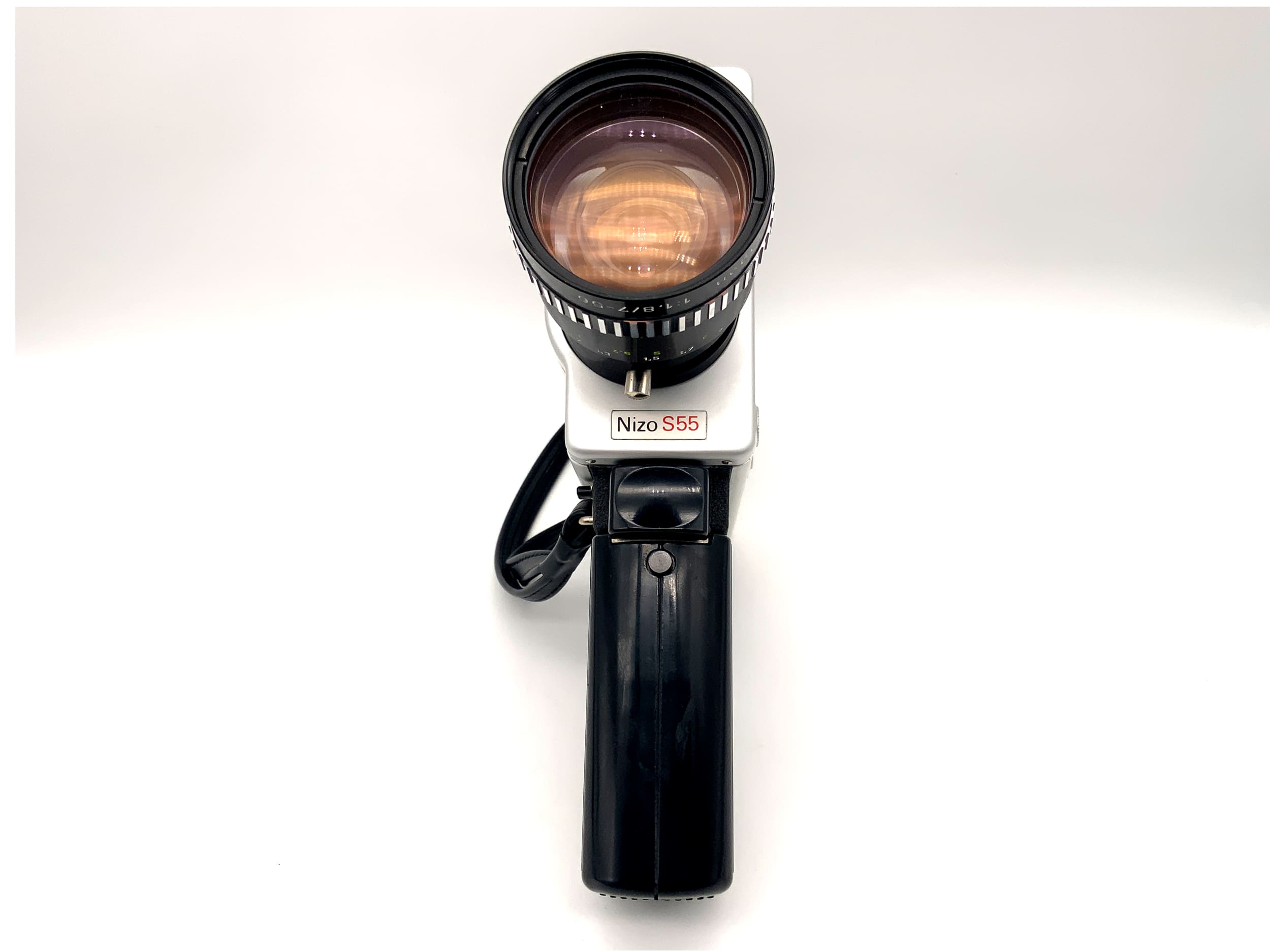 Caméra argentique Braun Nizo S55 avec objectif Variogon 1:1.8/7-56mm Super 8.